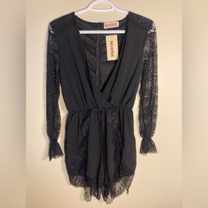 Size large NWT black romper